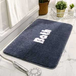 Commercial non-slip bath mat in a hotel bathroom – UK supply