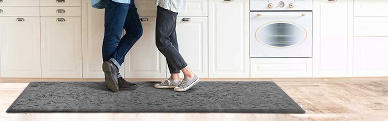 Close-up of anti-slip rubber mat with drainage holes on wet surface – suitable for commercial and industrial use in the UK