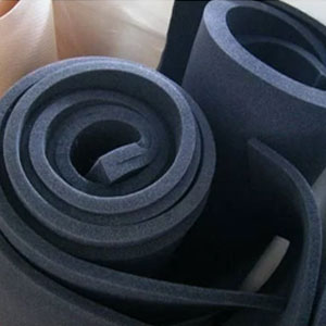 Industrial-grade self-adhesive rubber sheet applied along factory conveyor side-guards to absorb panel impac